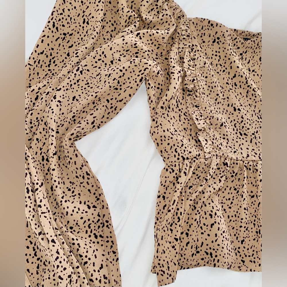 Off the shoulder animal print top.